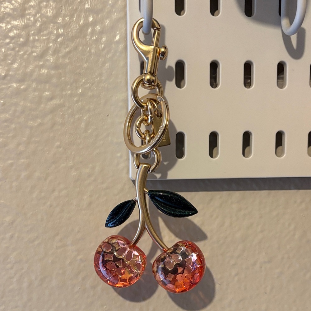Authentic Coach signature Cherry Charm Keychain with Gold Accents